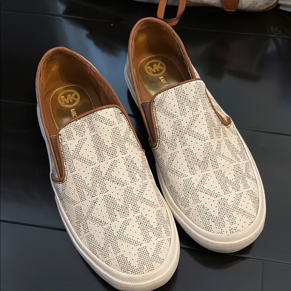 **SOLD**
Michael Kors Monogram Slip-On Sneakers - White and Tan